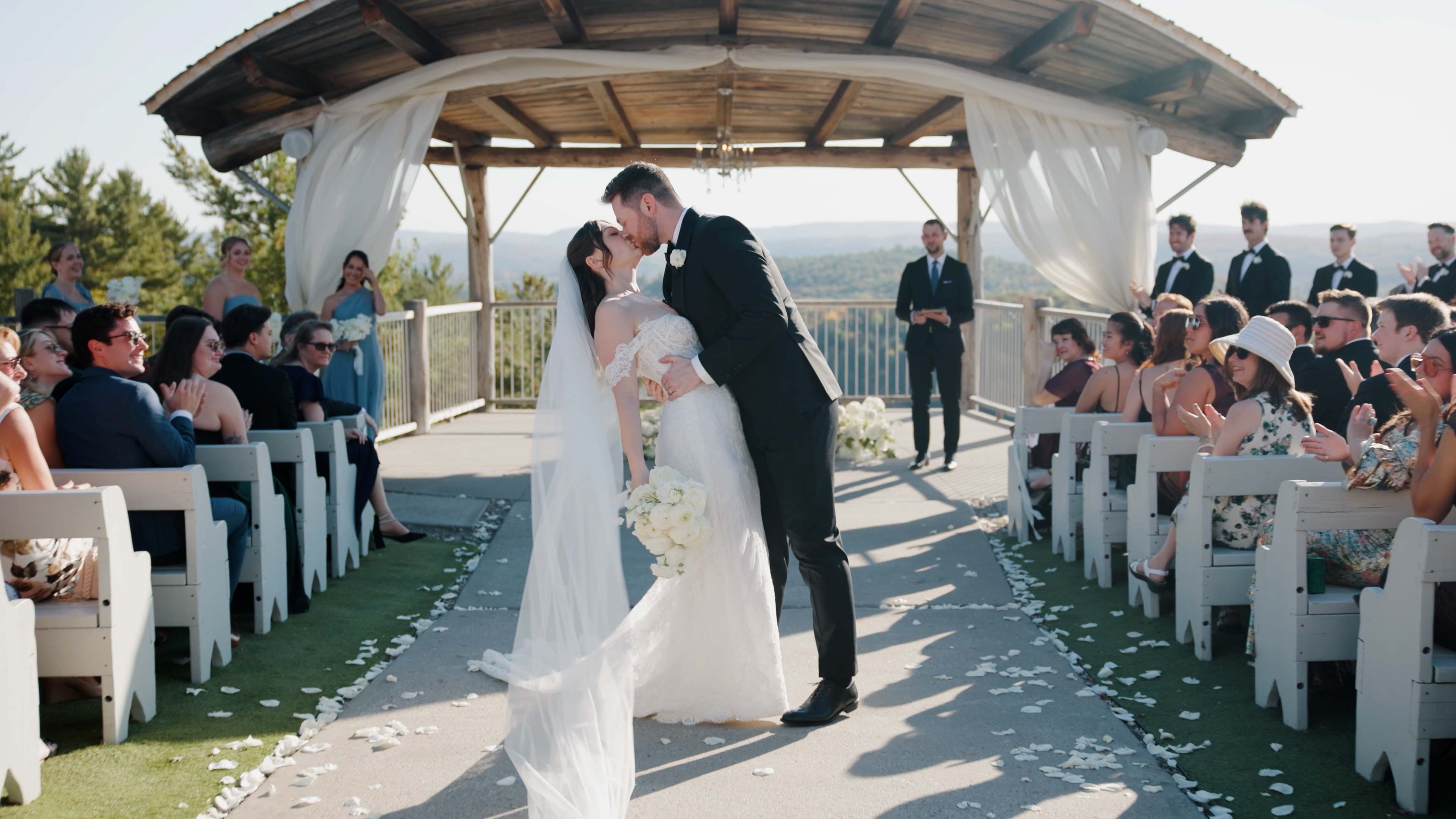 A couple framed against evening light on their wedding day